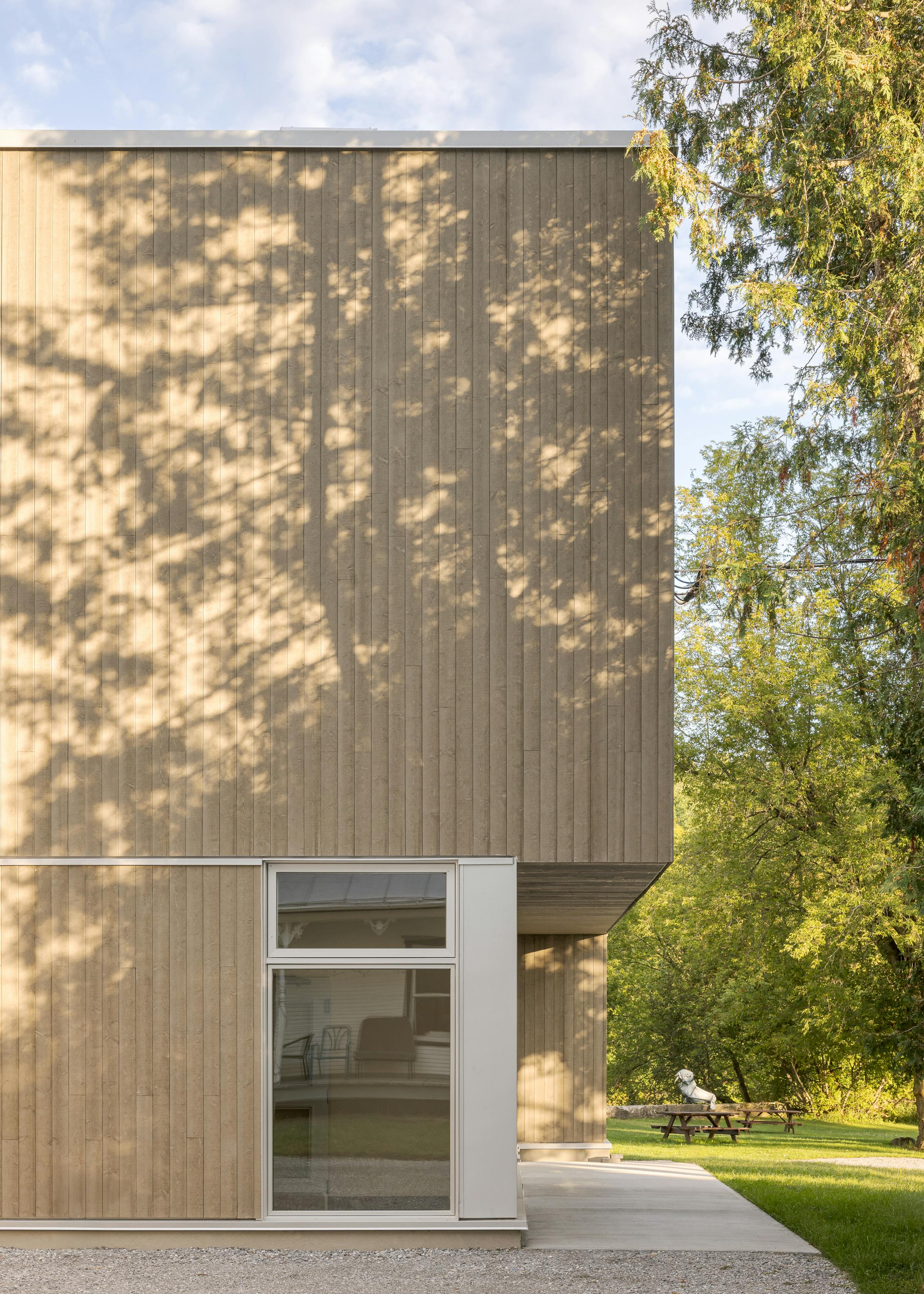 New buildings blending into the natural topography.