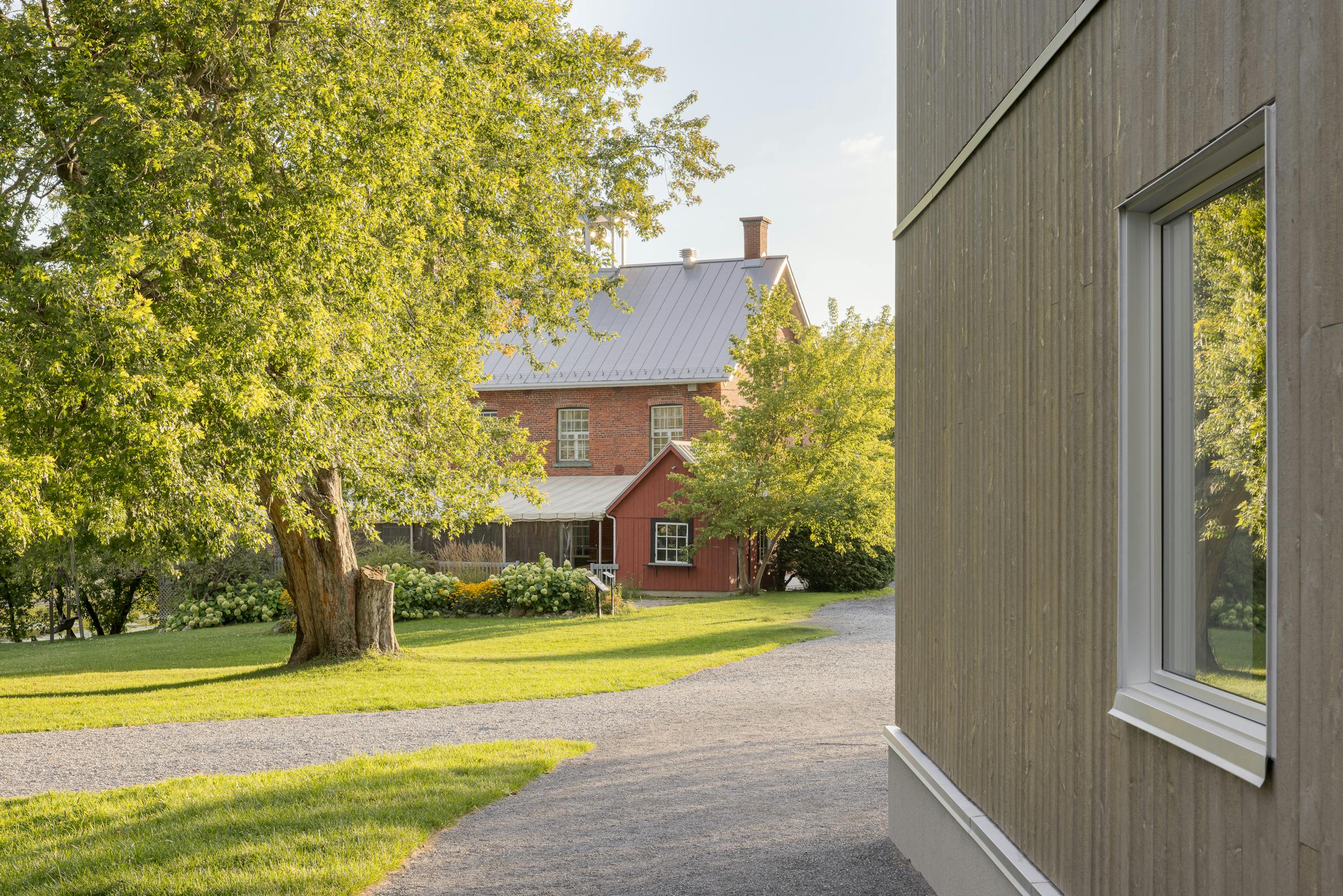 Architectural photograph revealing the dialogue between old buildings and contemporary interventions.