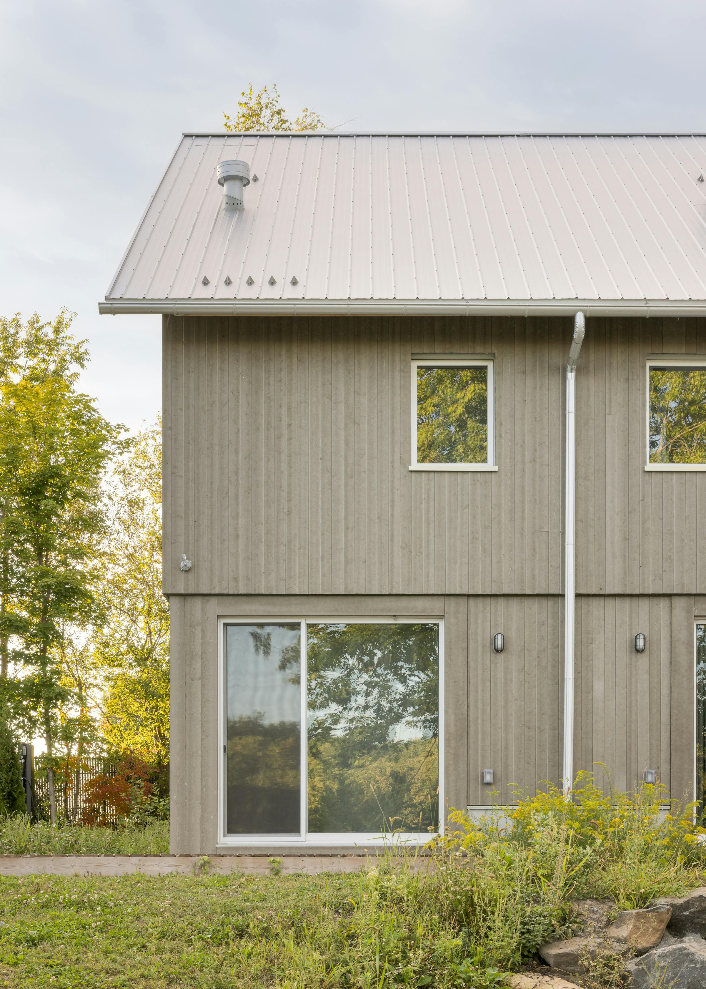 Artist residences integrated into the heritage estate.