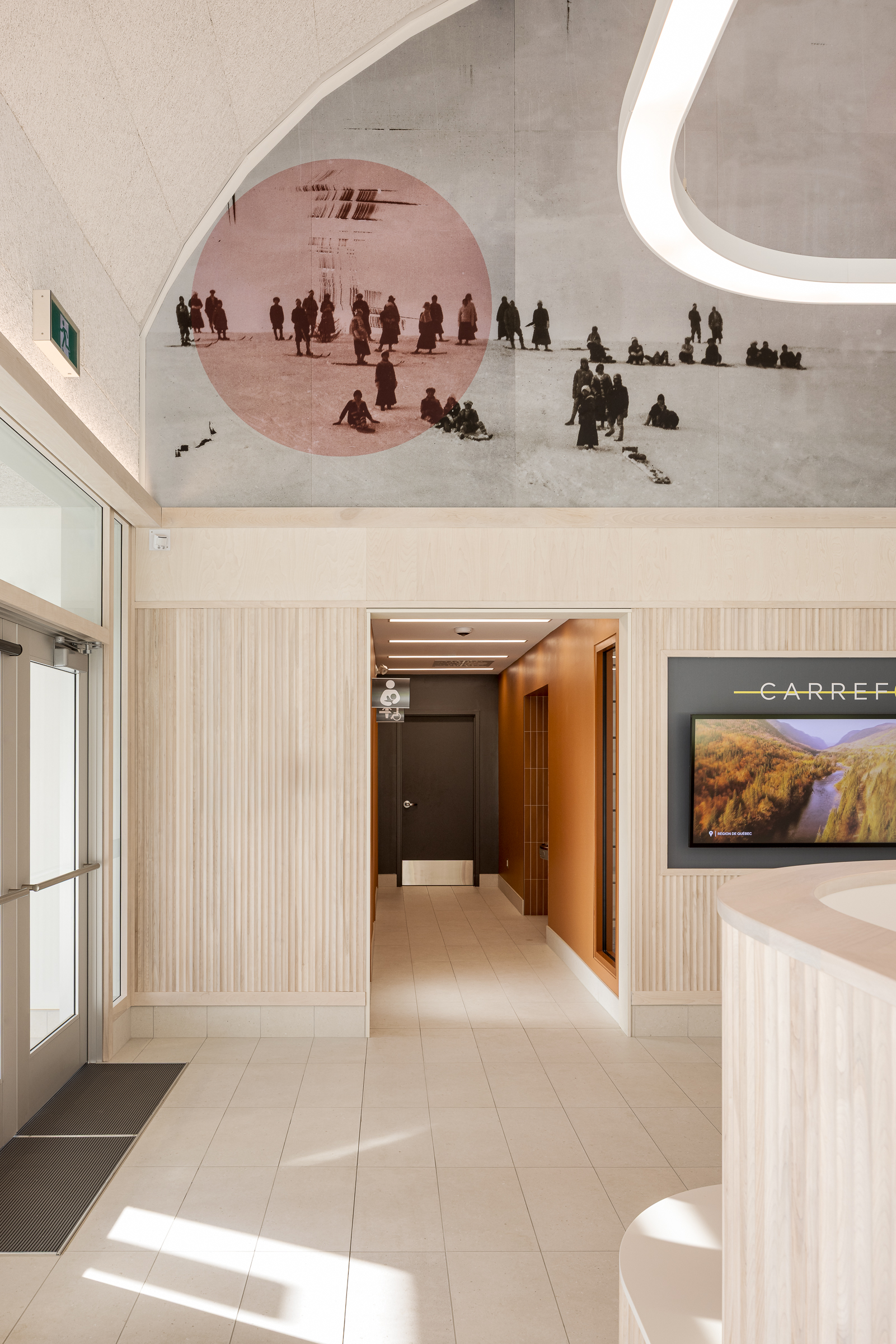 Interior perspective showing the harmony of materials and volumes.