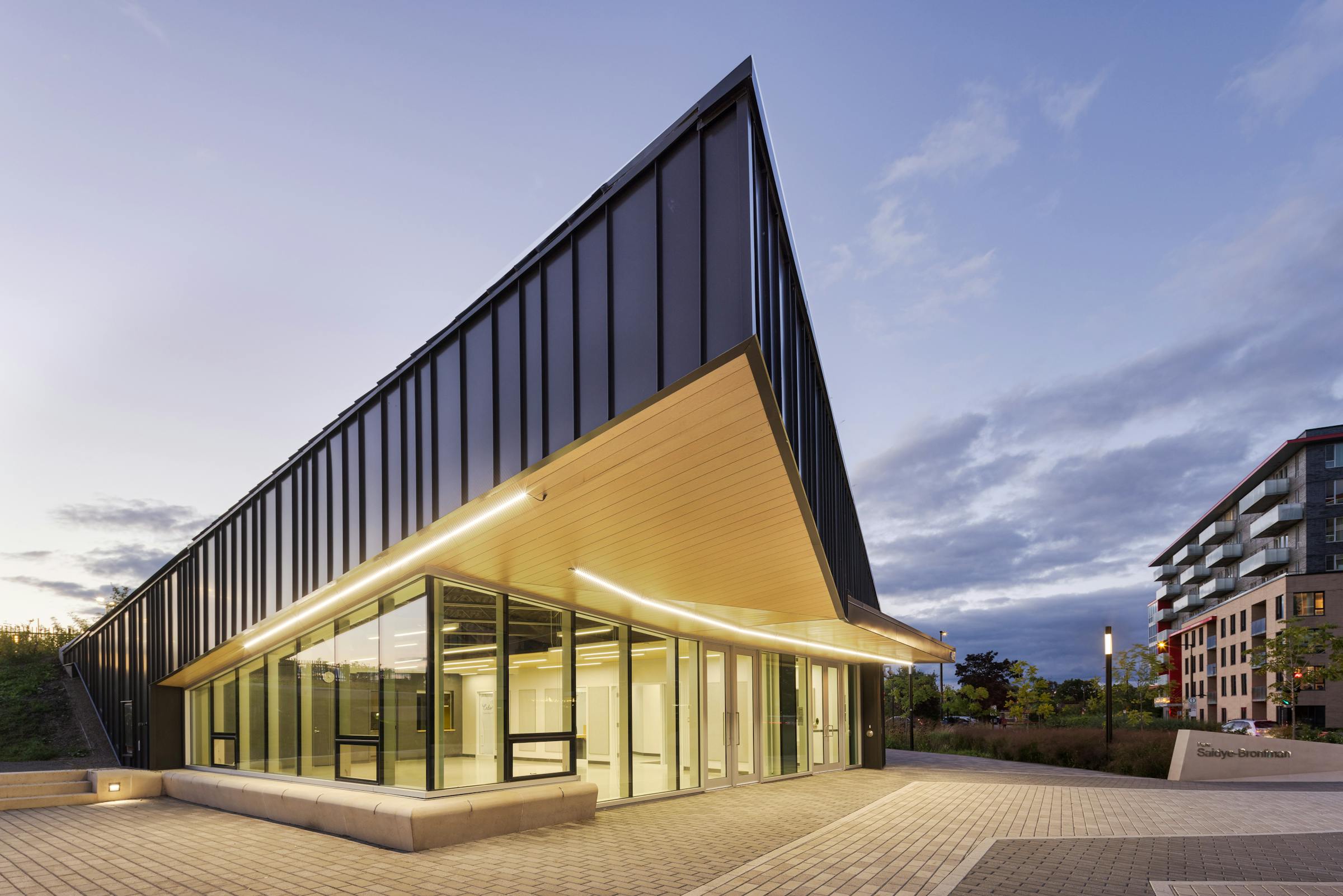 Wide angle photograph that highlights the modern architecture of a community center.