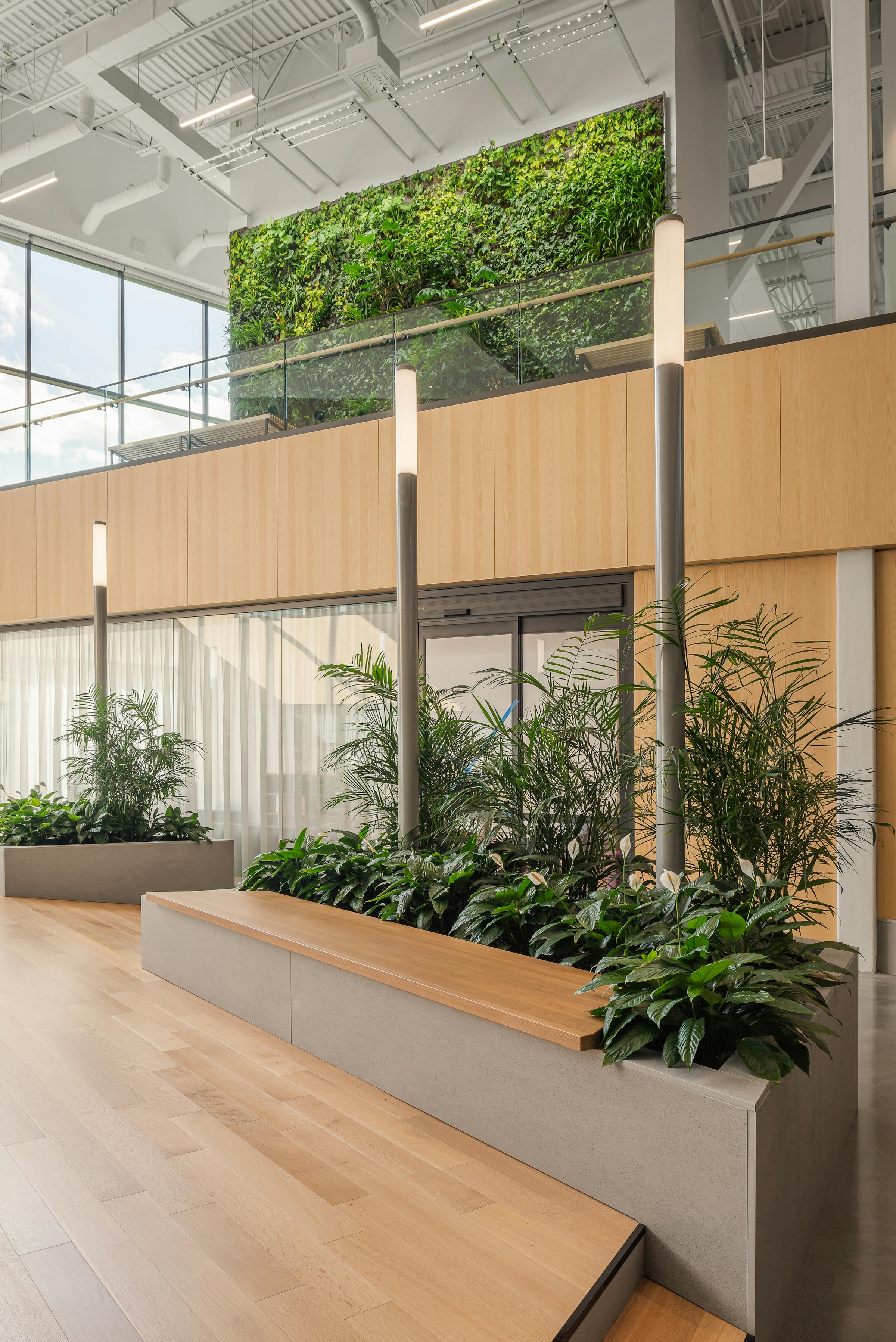 Fittings and interior design with a green wall and lush plantings.