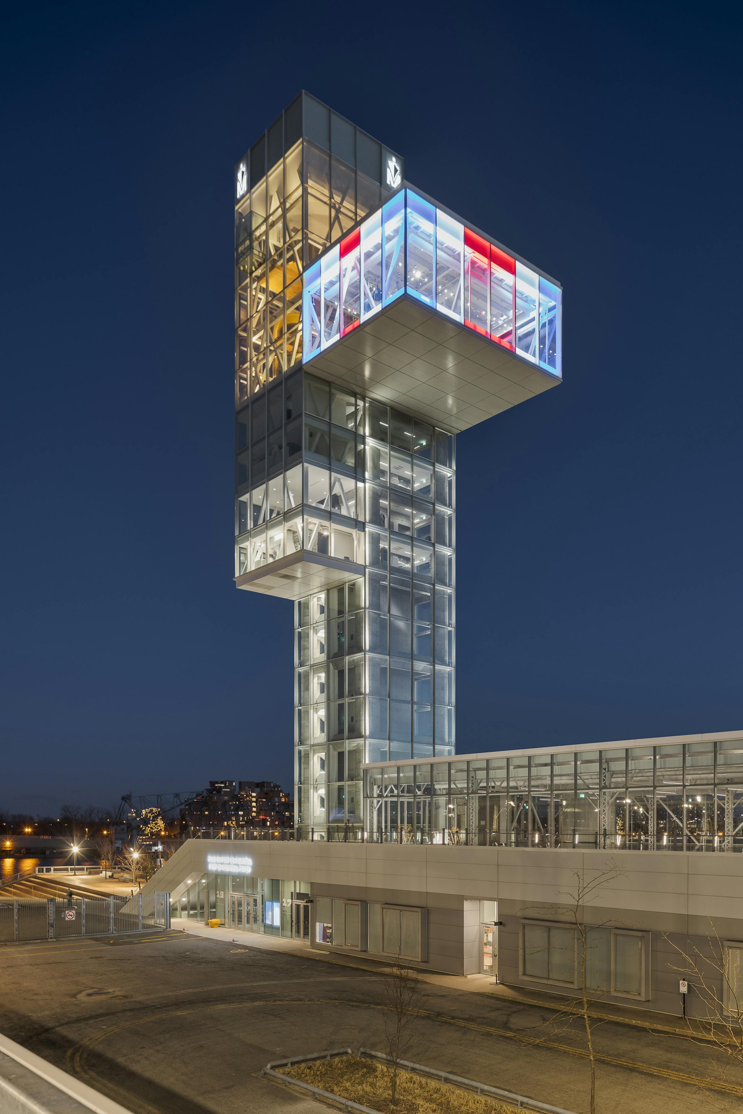 Night photography of the architecture of the observation tower in the old port of Montreal