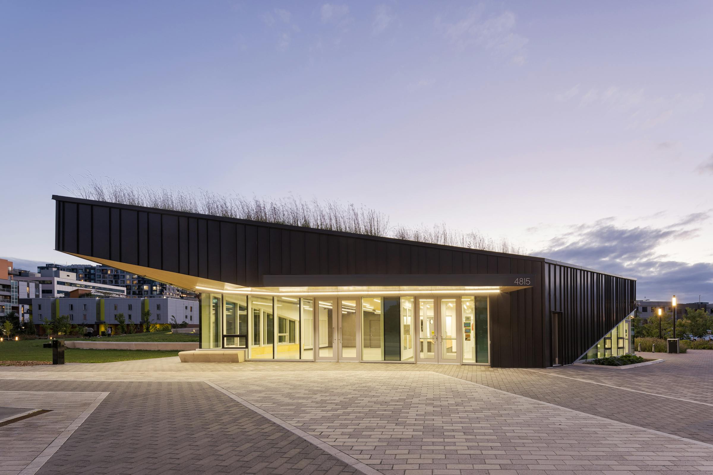 Blue hour photography of the architecture of a community building.