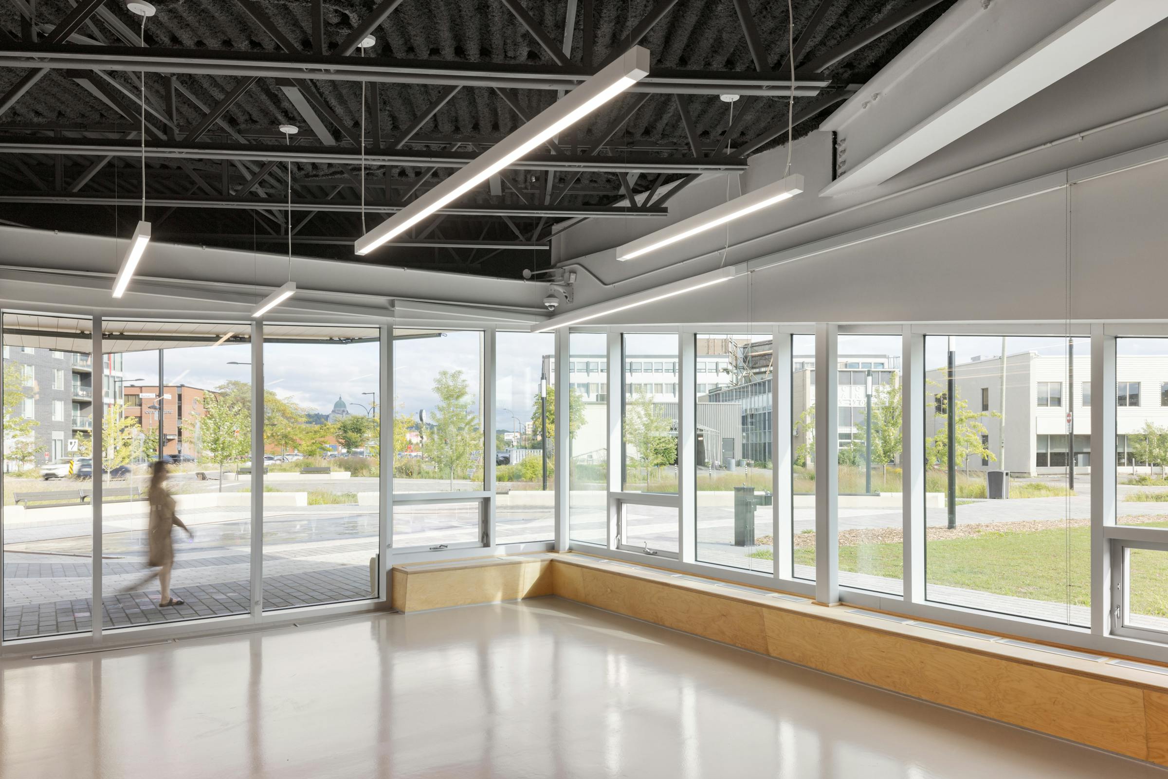 Interior photography with a view of the exterior landscaping.