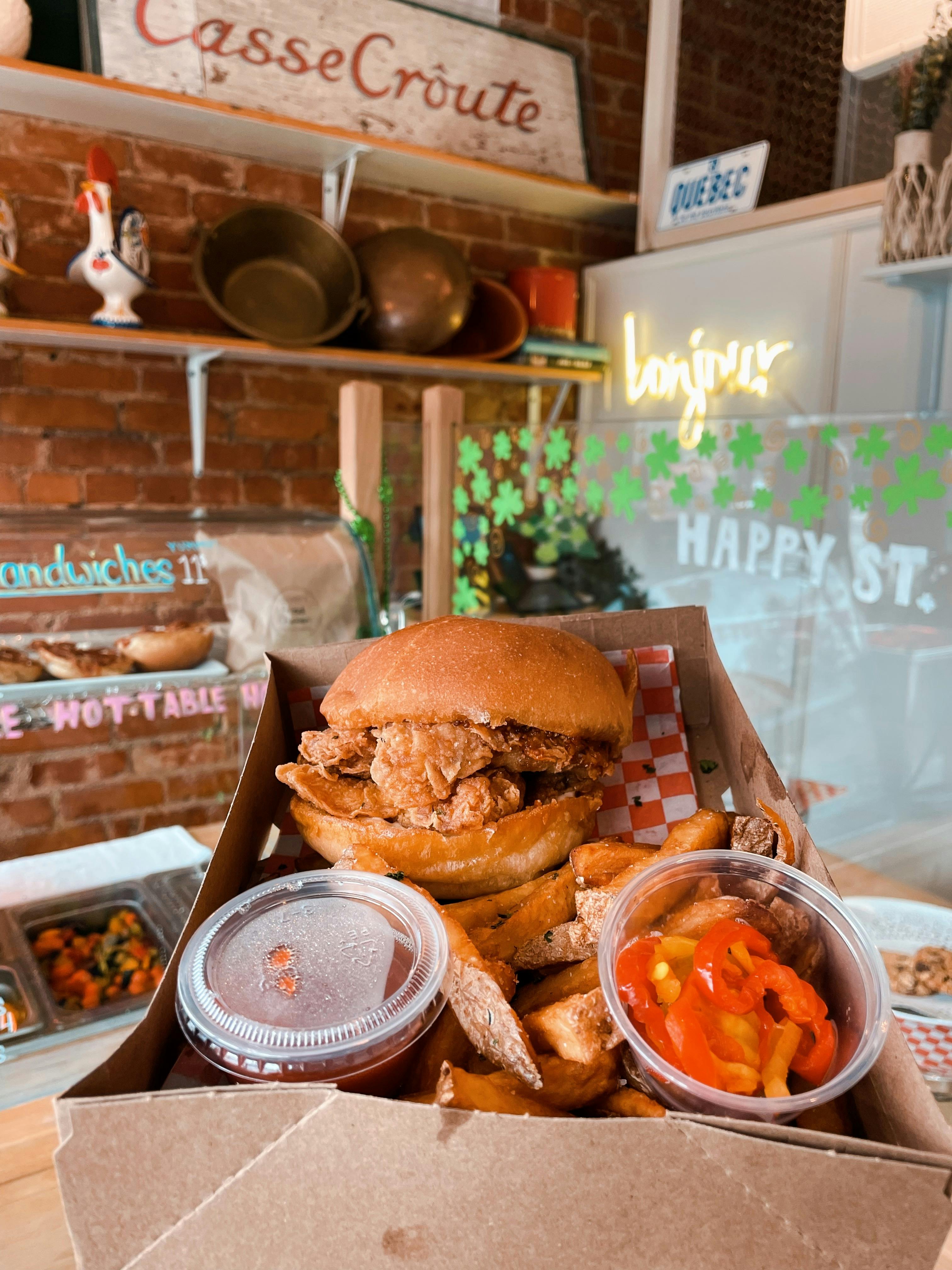 Fried chicken sandwhich with house slaw and fries ($11)