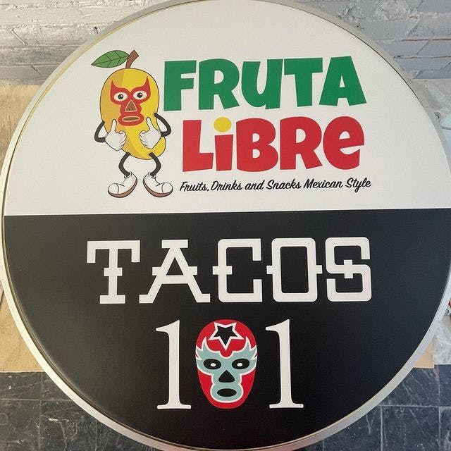 Tacos 101 Fruta Libre sign