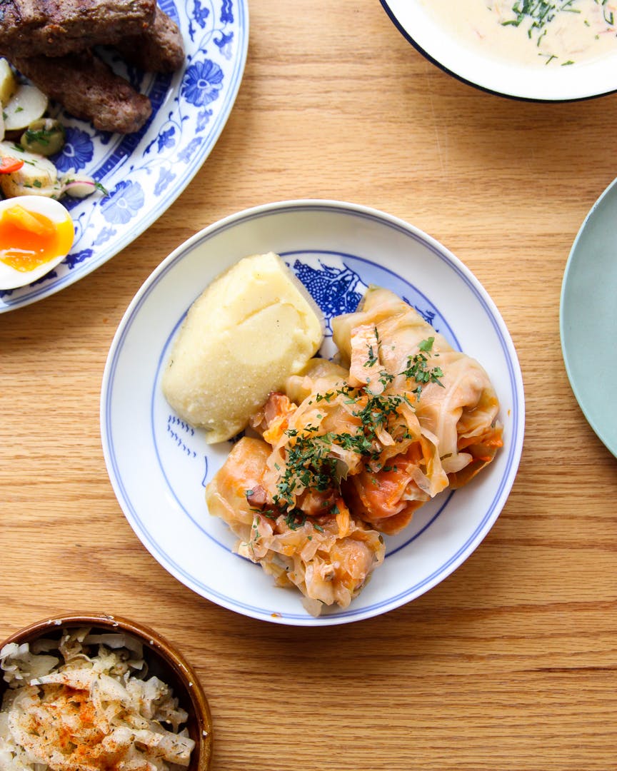 Sarmale (cabbage rolls) with mamaliga (polenta)