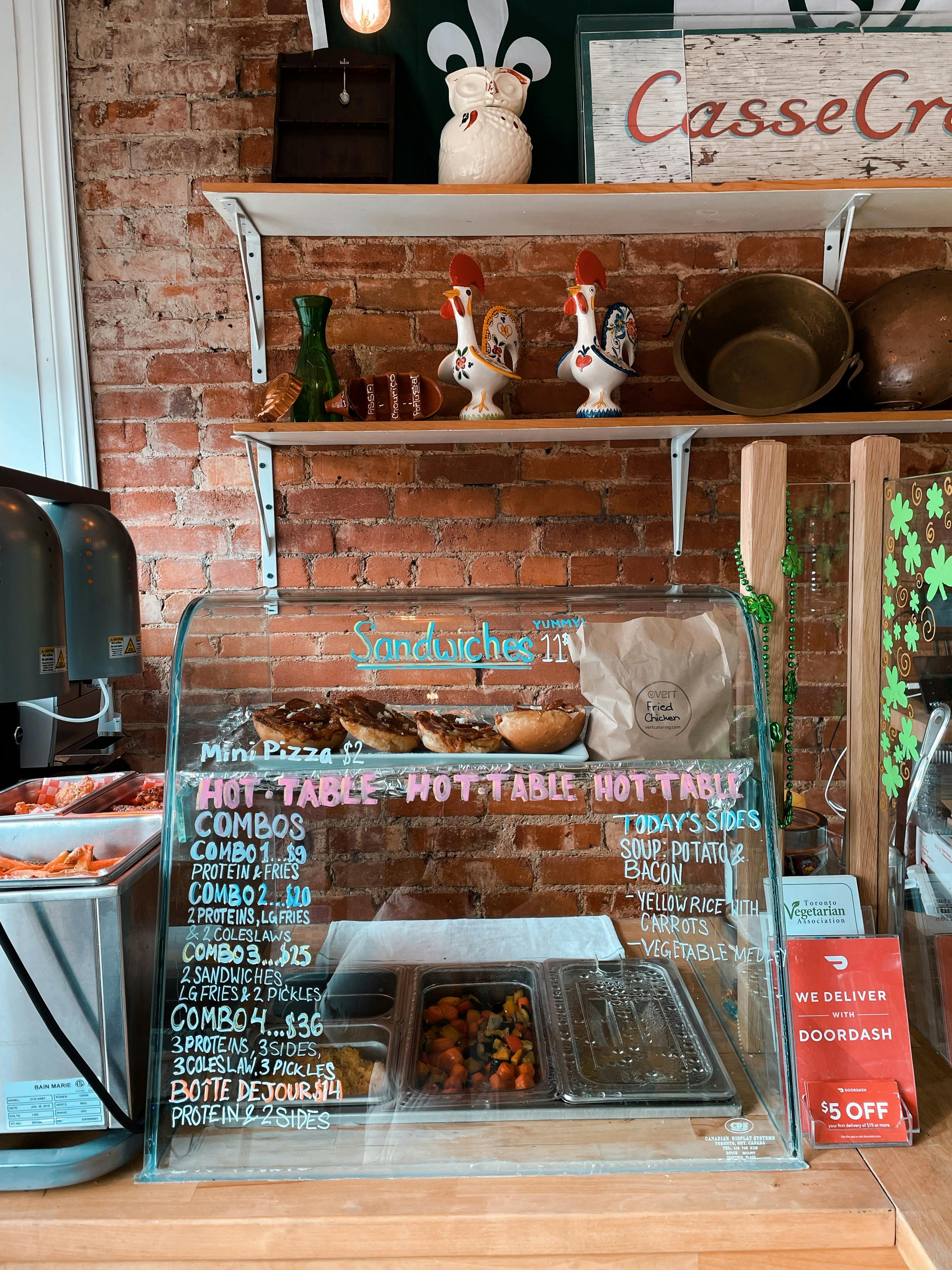 Vert's hot-food table featuring various vegan sides and proteins