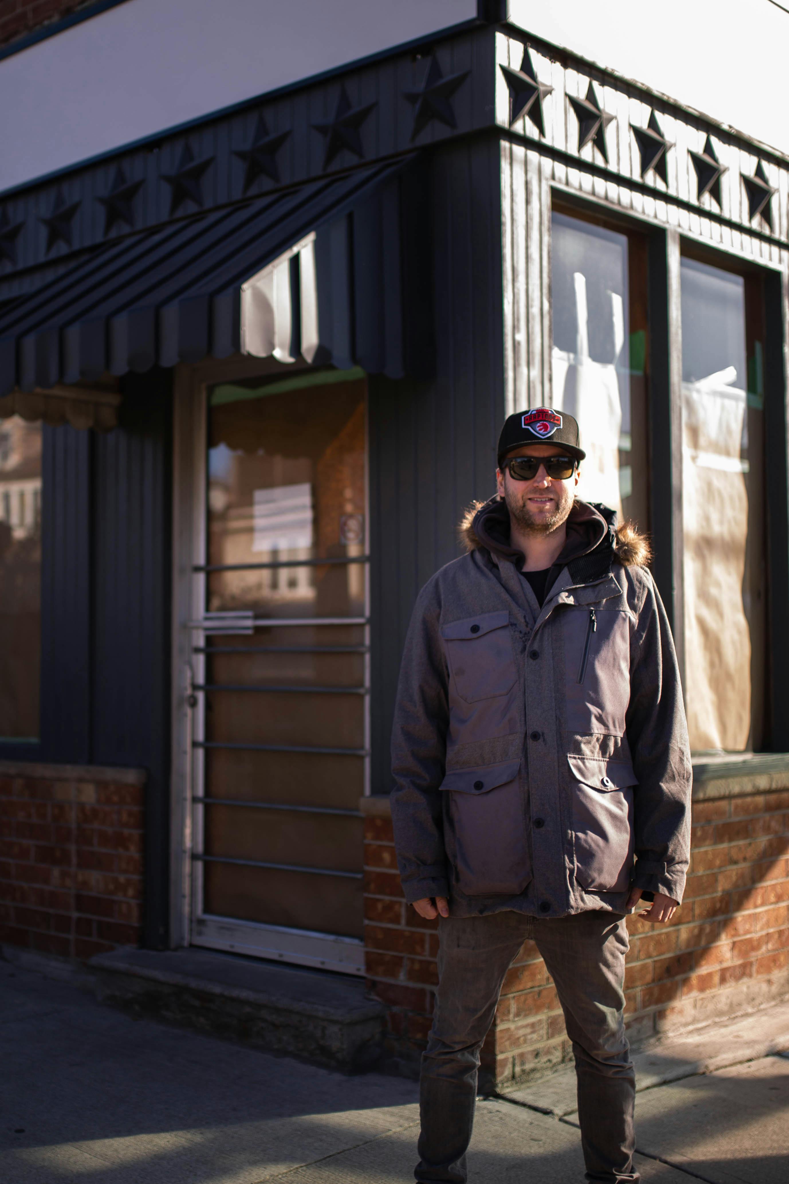 Luke Pollard, owner of One Night Only Pizza Toronto, stands out front of his new storefront in Riverdale.