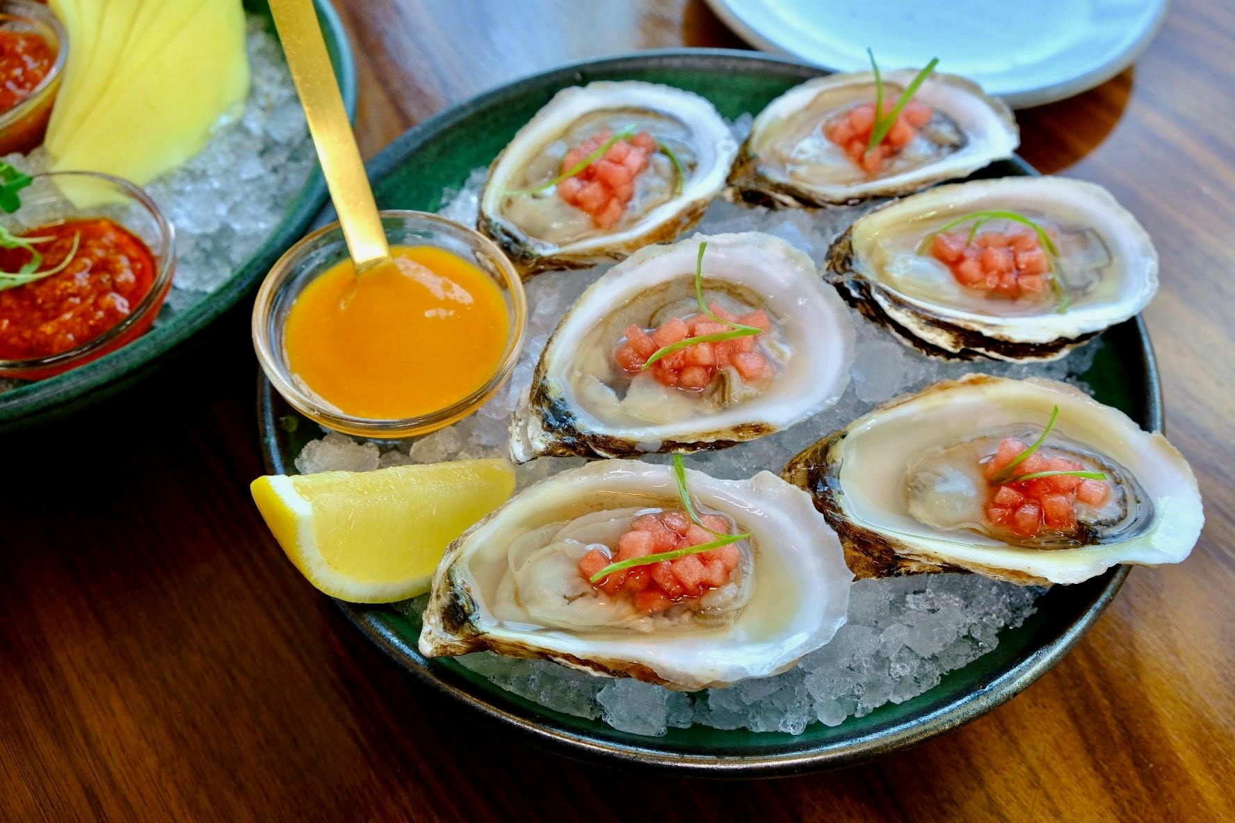 Fresh Oysters with a Watermelon Mignonette and House Hot Sauce