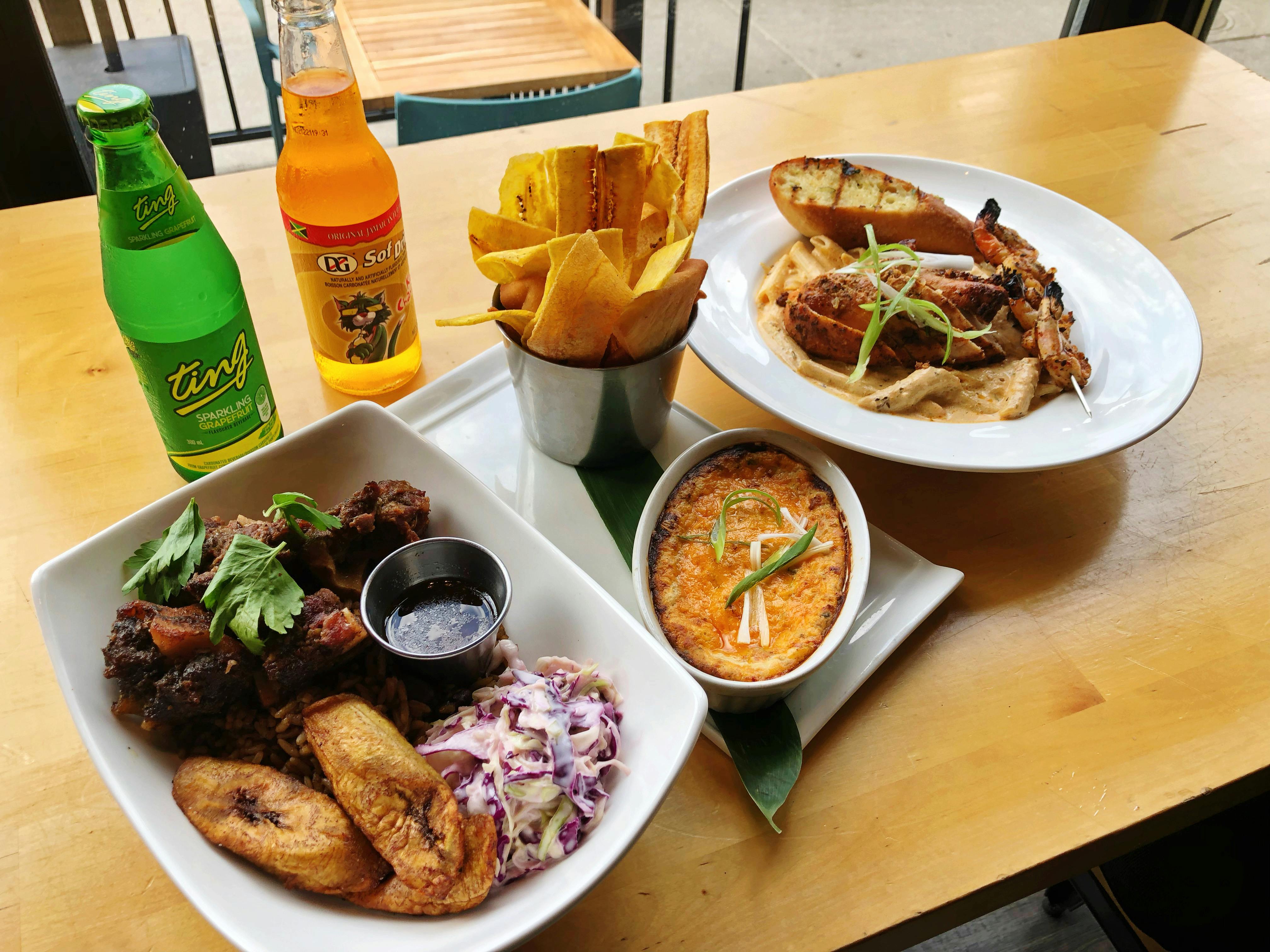 Braised Oxtail Bowl, Pimento Spinach Dip with Plantain & Pita Chips, Jerk Chicken Fettuccine Alfredo