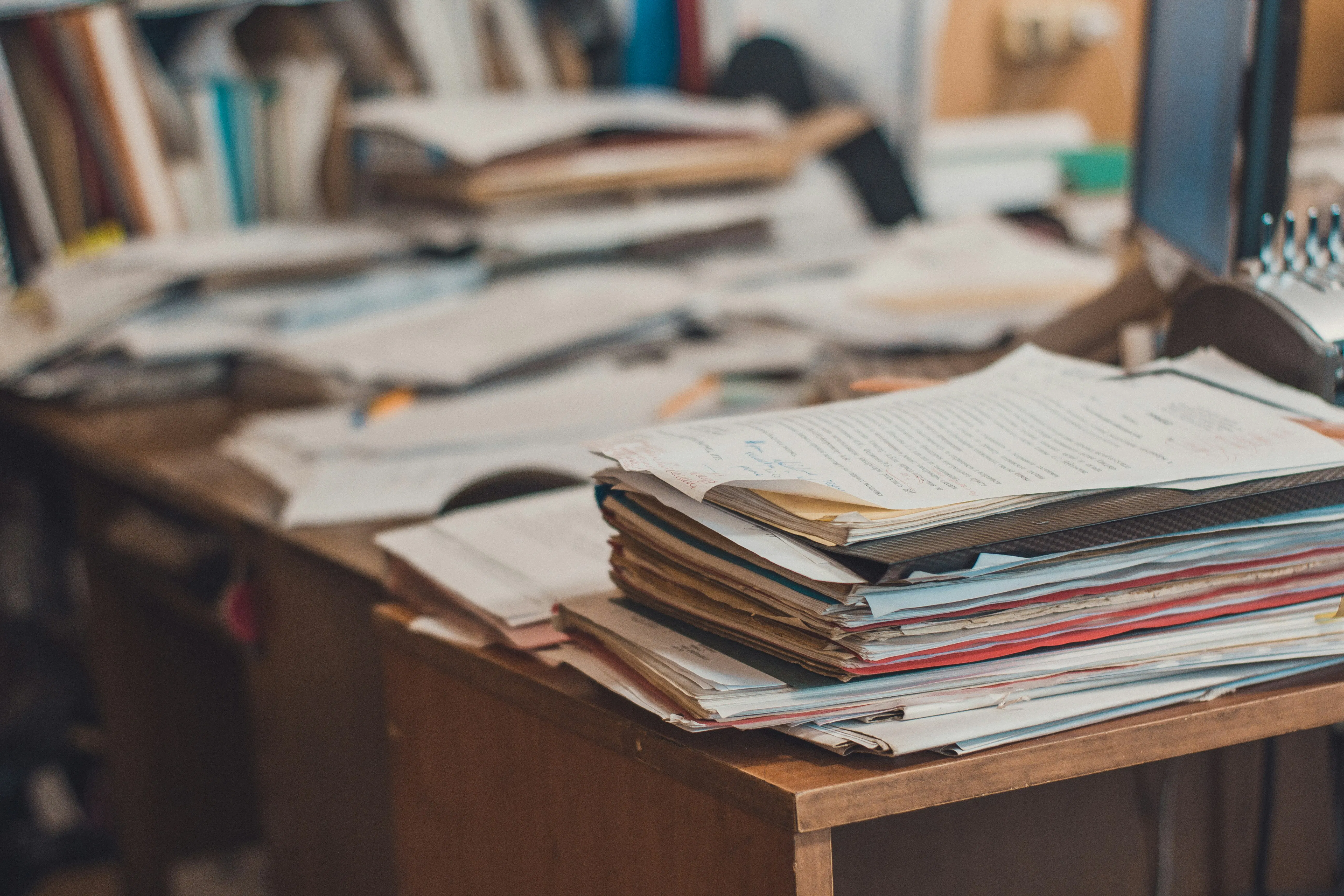 An image of a document heavy work desk
