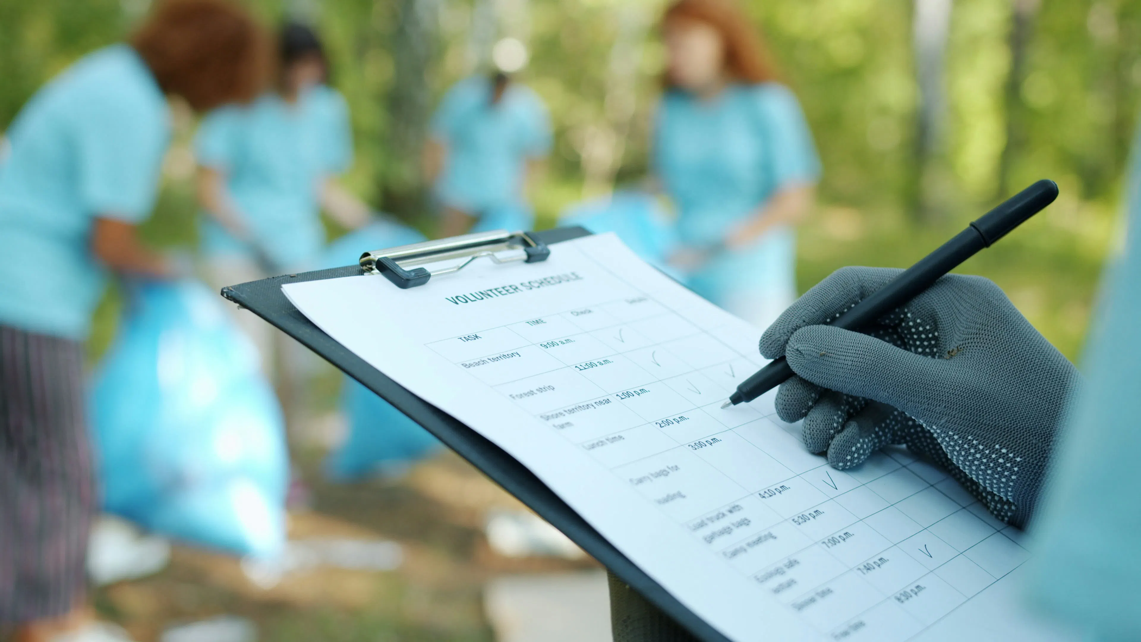 An image showing a field worker manually taking data