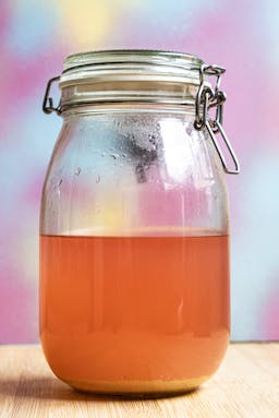 An image of a glass gar containing Rhubarb juice
