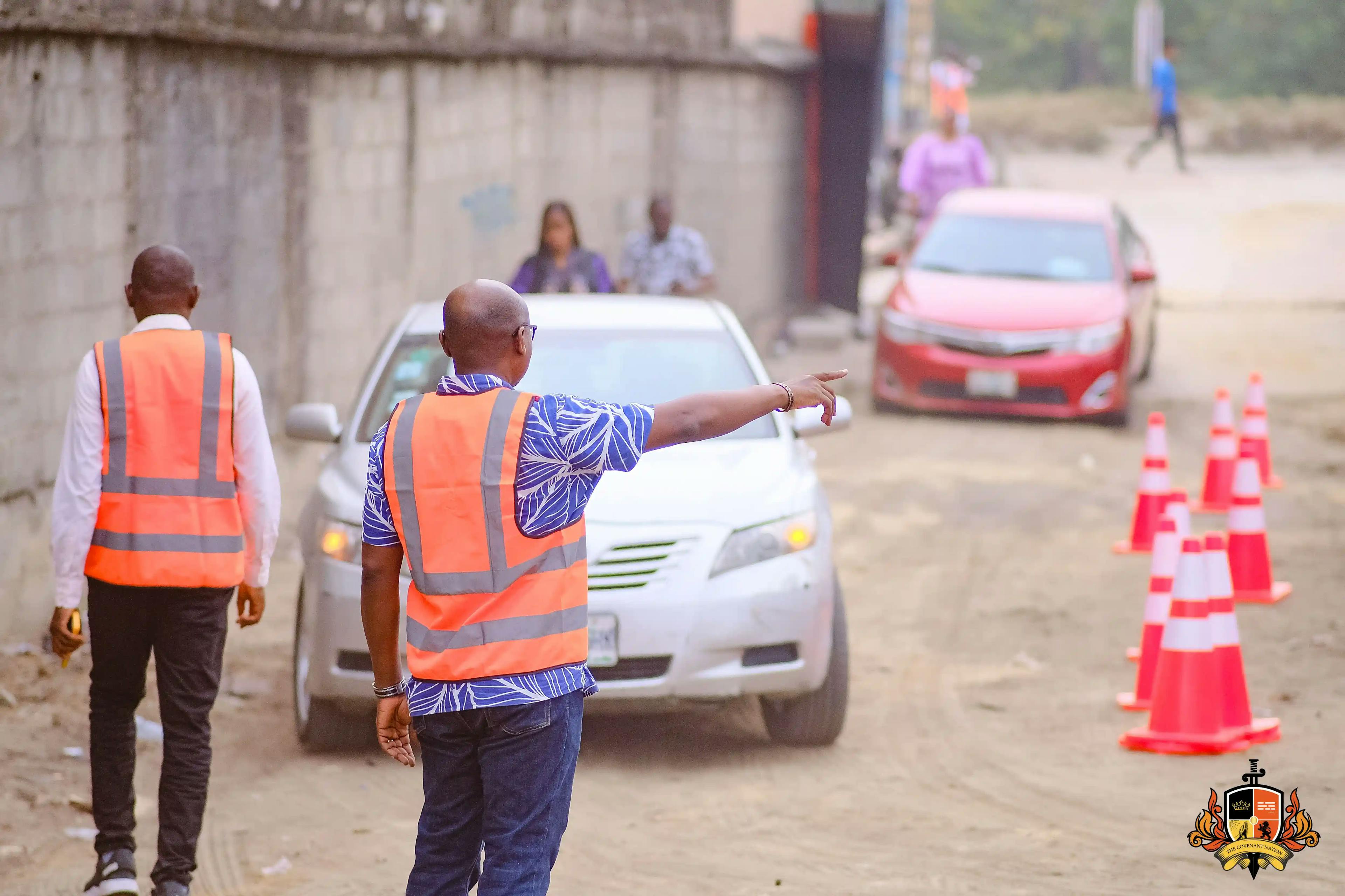 men directing traffic