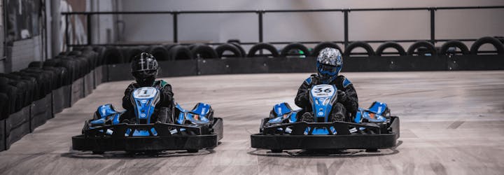 Two Karters Go-Karting side by side at TeamSport Eastleigh