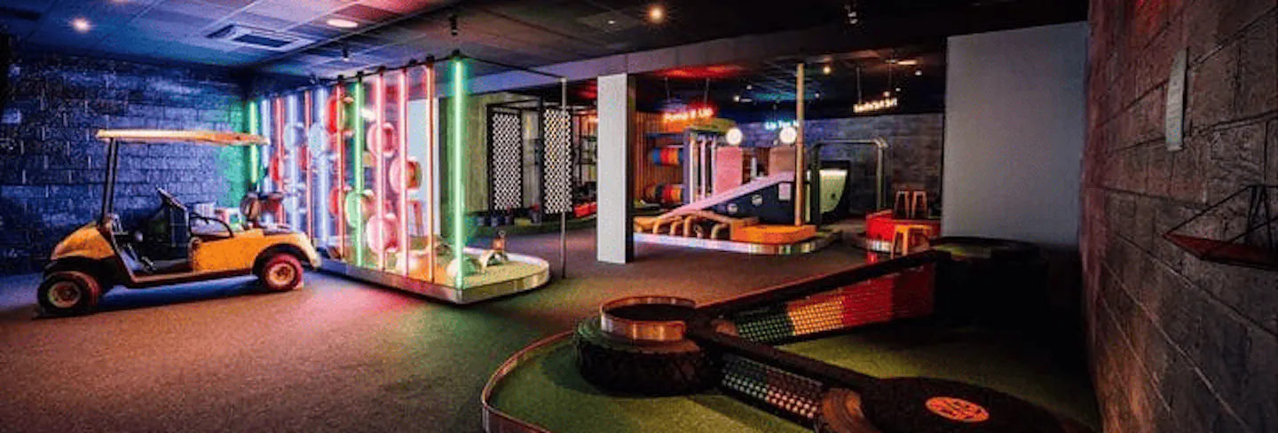 Immersive indoor mini golf course designed for families, groups, and casual play