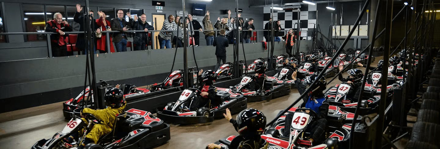 Karters In Pits Waving At Spectators