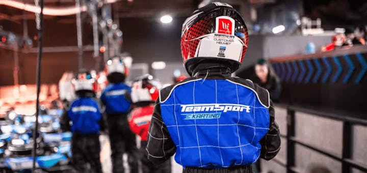 Kid Walking To Kart Pitlane