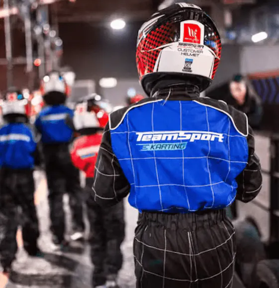 Kid Walking To Kart Pitlane