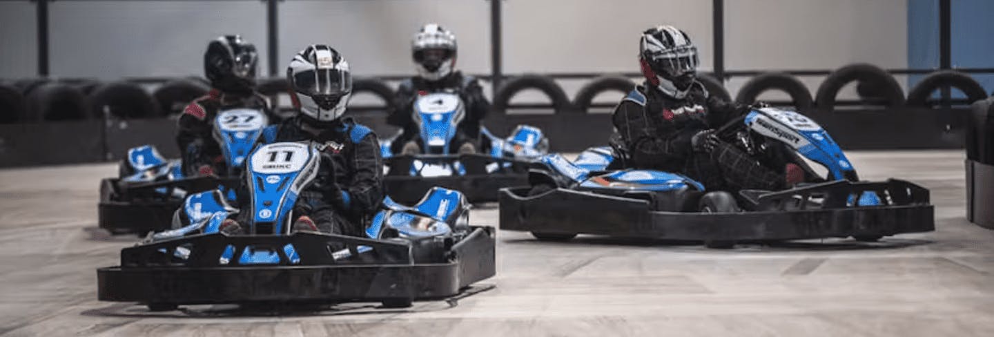 Four Go-Karters in E-karts
