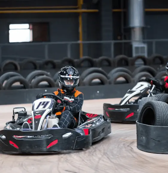 two karters in red karts