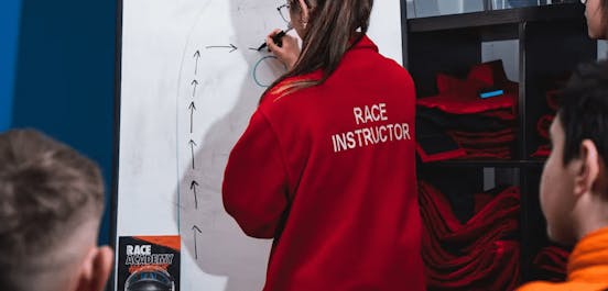 race instructor teaching race academy session