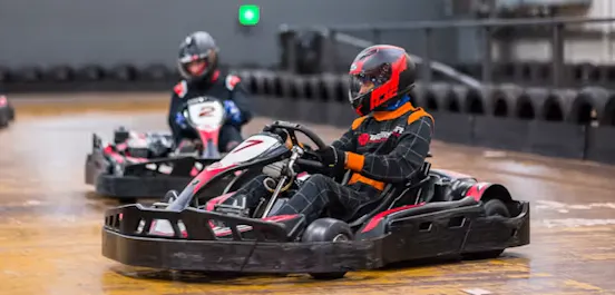 karters in red petrol karts