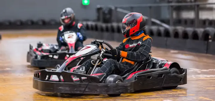 karters in red petrol karts