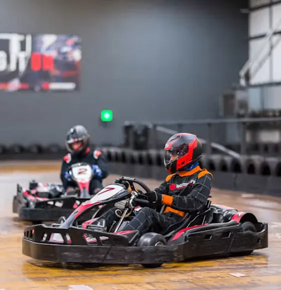 karters in red petrol karts