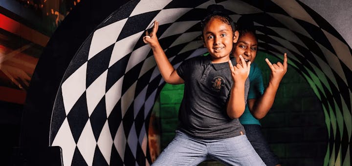 Kids Posing In A Putt Club Course
