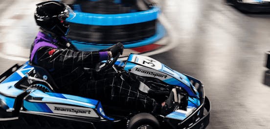 go-karter in blue electric kart