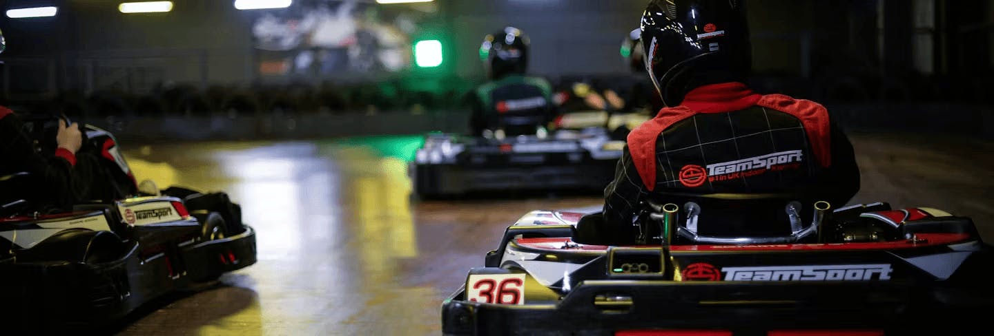 Behind shot of three karters in karts