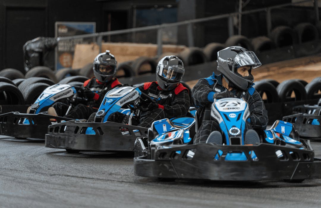 three karters in electric karts