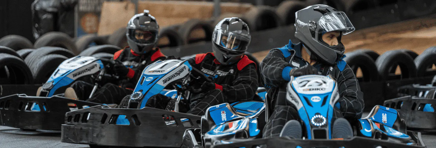 three karters in electric karts