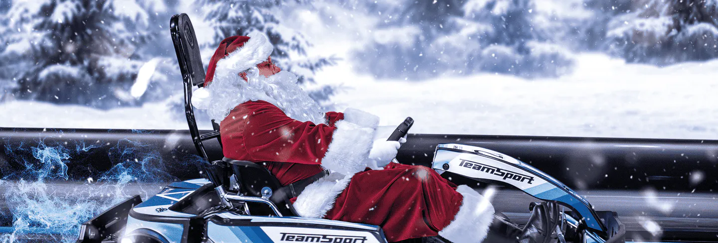 Father Christmas in a go kart