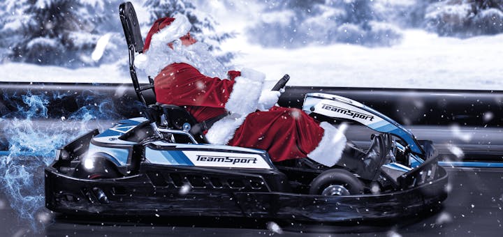 Father Christmas in a go kart