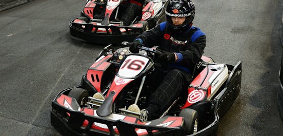 Two people karting in go-karts