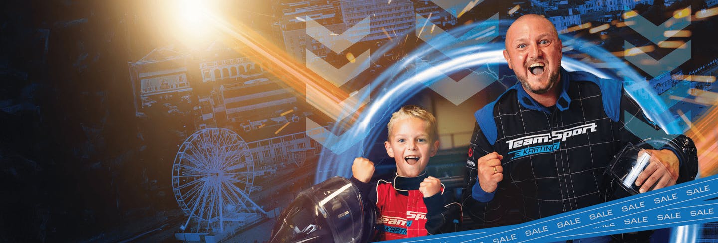 Father and Son celebrating at TeamSport Indoor Karting