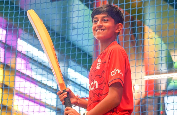 Boy playing virtual cricket at TeamSport Bournemouth