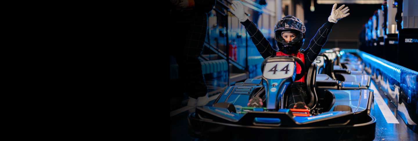 Kid in Go Kart on Starter Track