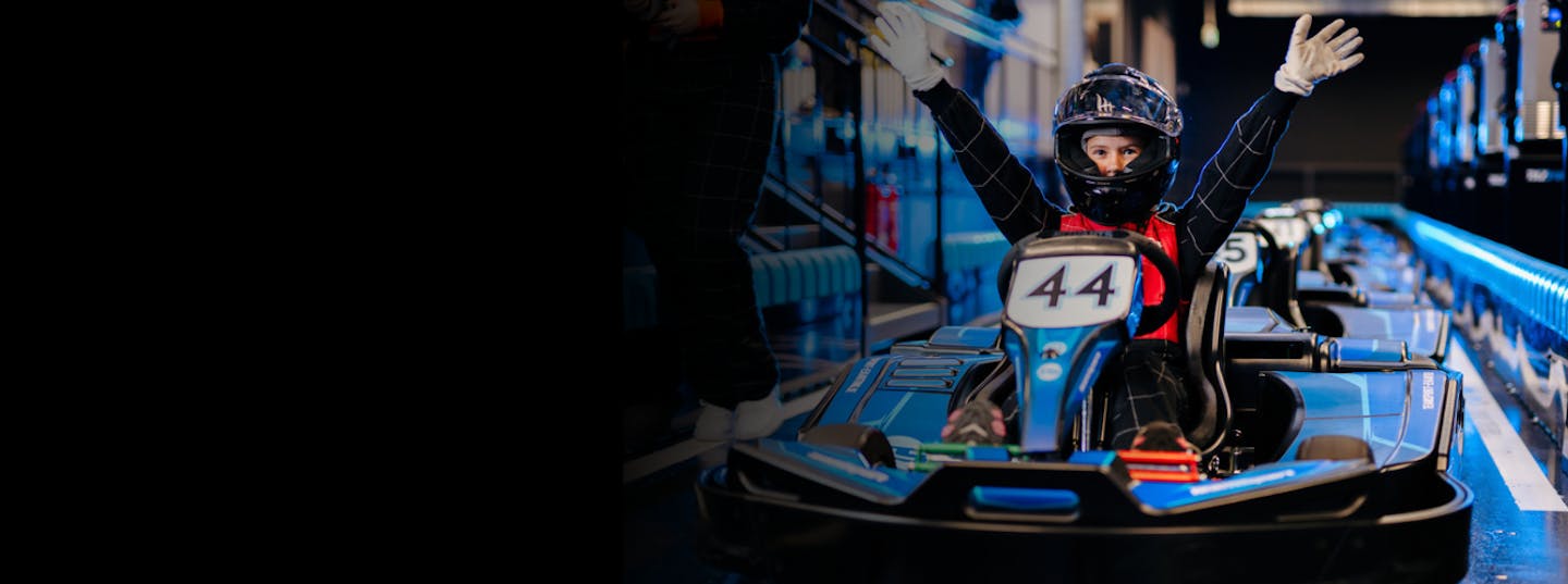 Kid in Go Kart on Starter Track