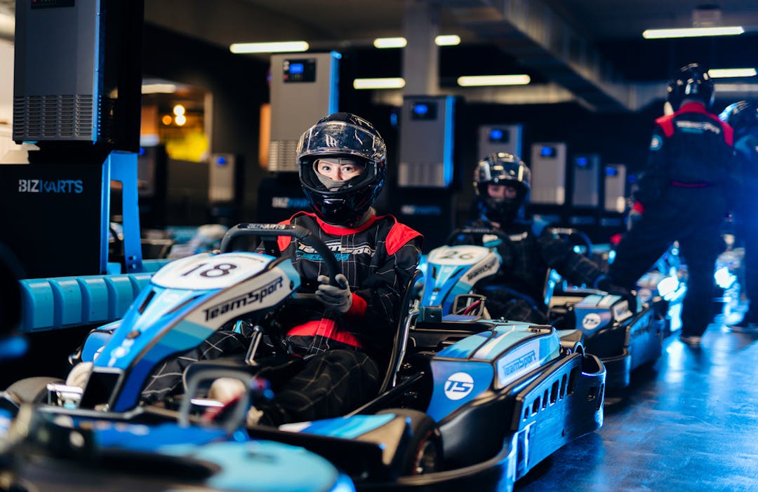 Excited First Time Karter in Helmet, Ready to Take Their First Laps On Track