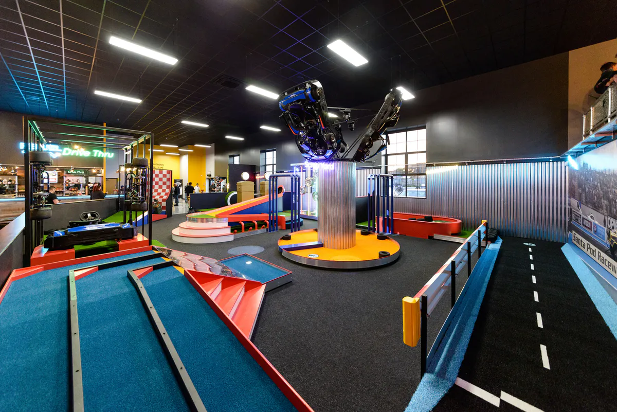 Putt Club Southampton motorsport‑themed crazy golf hole with interactive racing‑style obstacles