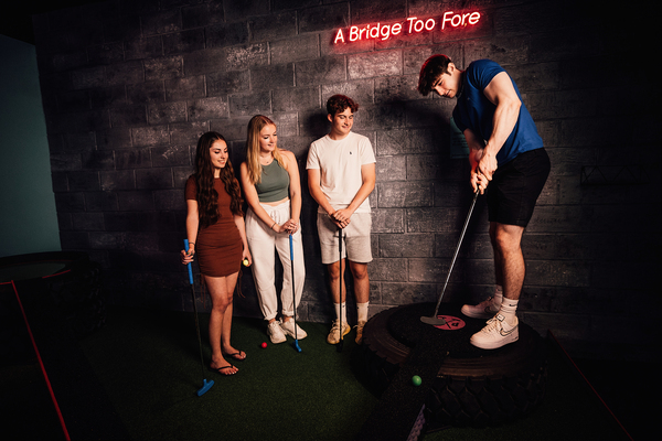 Group Playing Crazy Golf