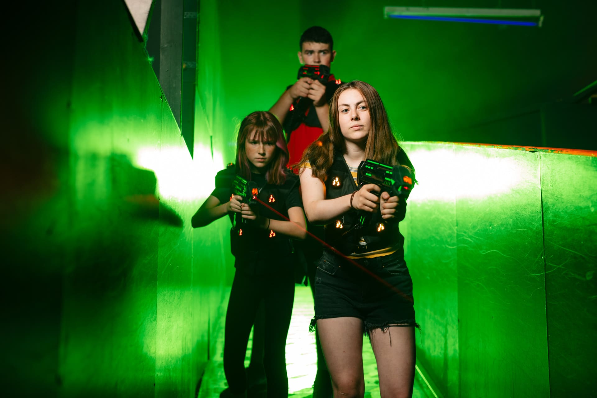 Group of players having fun during a laser tag session