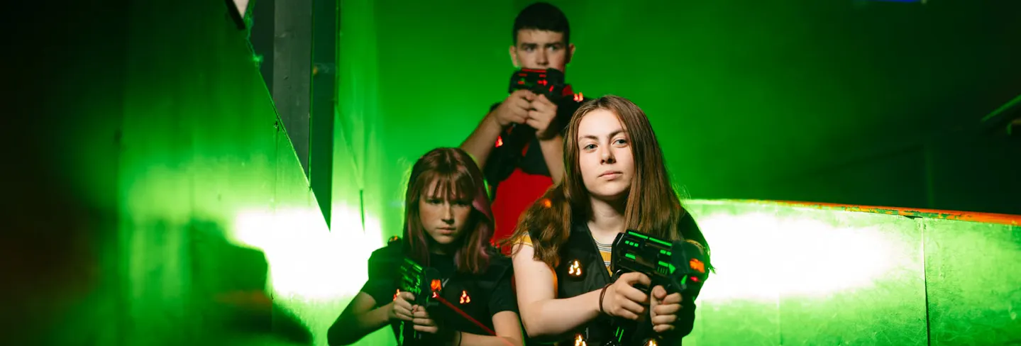 Group of players having fun during a laser tag session
