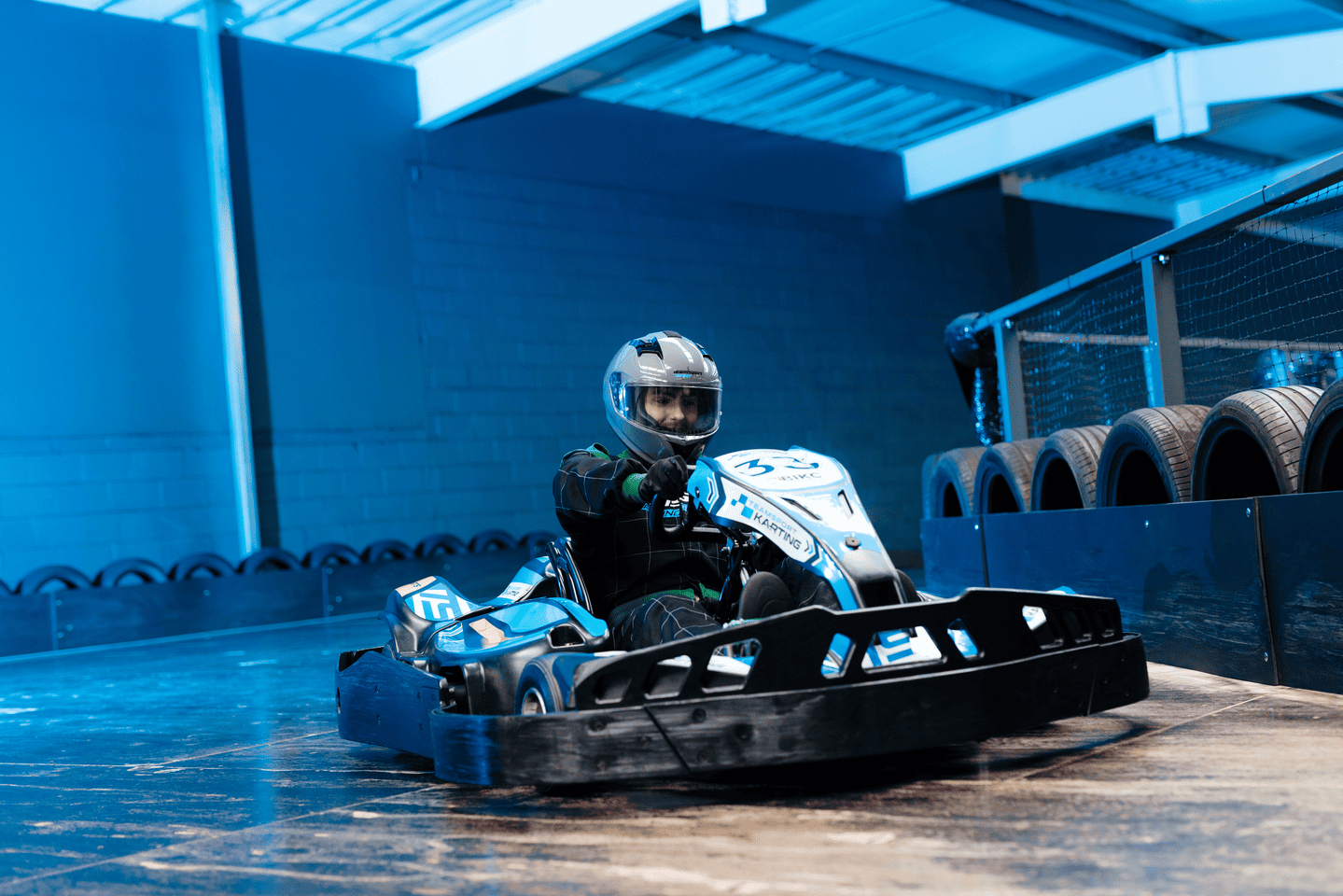 Male Karter On Electric Blue TeamSport Go Kart