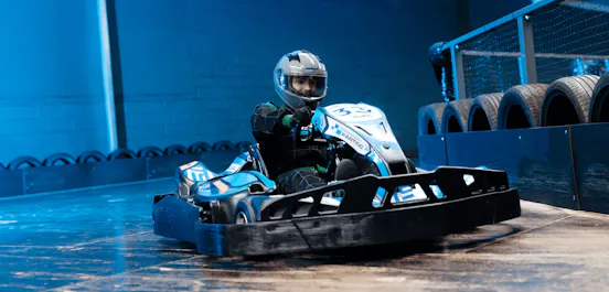 Male Karter On Electric Blue TeamSport Go Kart